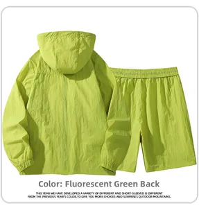 Back view of fluorescent green hooded outdoor jacket and shorts suit in lightweight nylon