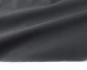 Close-up of high-quality wrinkle-resistant woven fabric texture for men's vest