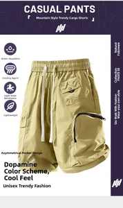 Detail of khaki cargo shorts showing water-repellent fabric and asymmetric pockets