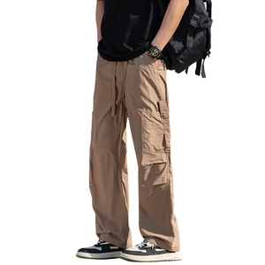 Men's khaki cargo pants featuring relaxed straight fit and functional flap side pockets