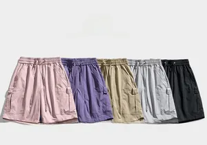 Detailed flat lay of multi-color cargo shorts featuring elastic waist and large side pockets