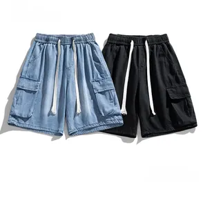 Detailed flat lay of washed denim cargo shorts in light blue and black with drawstring waist