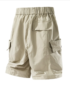 Detail view of khaki water-repellent cargo shorts with elastic drawstring waist and side pockets