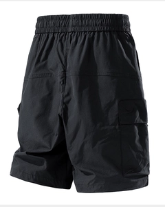 Rear view of black cargo shorts with elastic waist and large side utility pocket