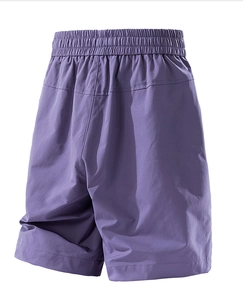 Detail shot of purple casual shorts featuring elastic waistband and reinforced back stitching