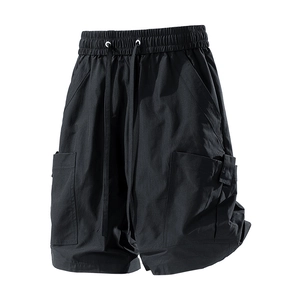 Men's loose black cargo shorts with elastic drawstring waist and large side pockets