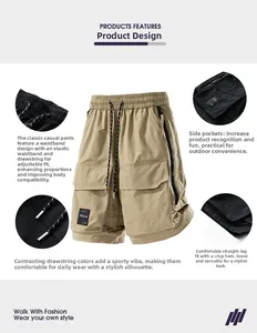 Dettaglio dei pantaloncini cargo kaki con vita elastica, coulisse e tasche laterali