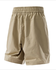 Detail view of khaki casual shorts featuring elastic drawstring waist and back stitching
