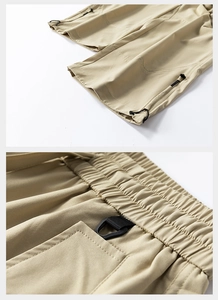 Dettaglio dei pantaloni da trekking kaki con orlo regolabile e vita elastica con anello a D
