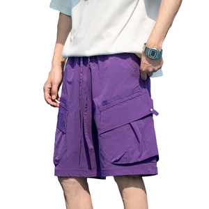 Men's purple cargo shorts with large flap pockets and adjustable drawstring waist