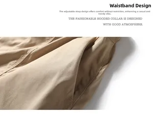 Detail of khaki cargo shorts showing the elastic waistband with webbing strap and side pocket