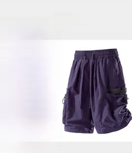 Detail view of purple quick-dry utility shorts featuring waterproof tech fabric and side pocket