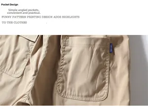Detail view of khaki cotton cargo shorts featuring slanted pockets and City Boy tag