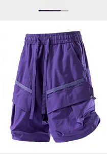 Detail of purple cargo shorts featuring high elastic waistband and adjustable drawstrings