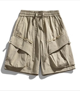 Detail of cargo shorts showing elastic drawstring waist and large tactical pockets