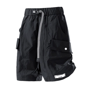 Water-repellent cargo shorts in black with elastic waist and checkered belt