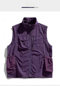 Detailed view of purple functional utility vest with multiple pockets and stand collar