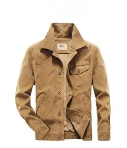 Detailed view of the camel corduroy jacket featuring a front flap pocket and classic buttons