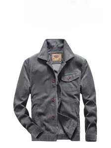 Close-up of vintage grey corduroy jacket featuring classic lapel and breast pocket