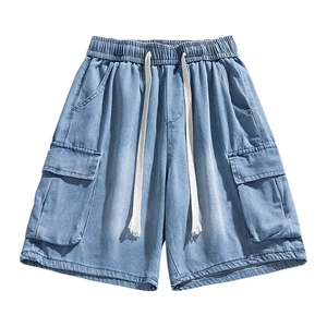 Men's loose light blue cargo denim shorts with large pockets and elastic drawstring waist