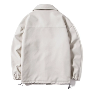 Detail of drop-shoulder men's jacket featuring elastic cuffs and adjustable drawstring hem