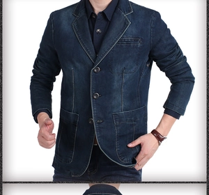 Detail of slim fit dark blue denim blazer featuring triple buttons and washed texture