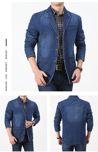 Detail of men's blue denim blazer showing lapel collar, buttons and chest pocket texture