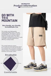 Detail of khaki techwear shorts featuring breathable fabric and side zipper accents