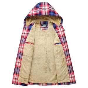 Detail of the thick beige faux shearling lining and plaid hood on the men's winter shirt