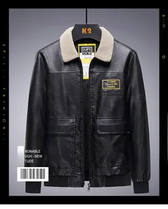 Detail view of men's black PU leather jacket featuring a plush fleece collar and chest patch