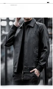 Close-up of black PU leather jacket with AL embossed logo and ribbed cuffs