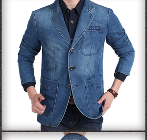 Detail of blue denim blazer jacket with three buttons and classic patch pockets