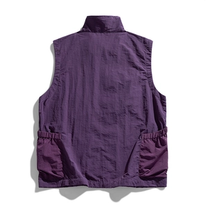 Outdoor functional purple vest for hiking with utility back pockets and textured nylon fabric