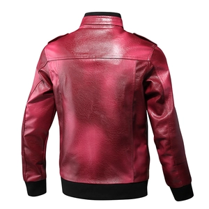 Detail of burgundy biker jacket featuring ribbed cuffs and stand collar shoulder epaulets