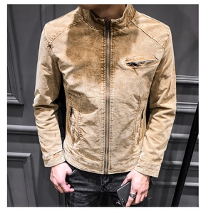 Detail of vintage khaki cotton jacket featuring metal zipper and stand collar
