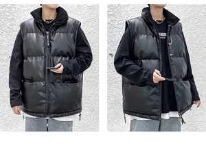 Detail view of black PU leather puffer vest with sherpa collar lining and hem drawstring