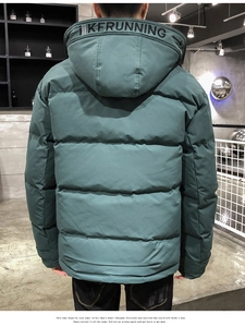 Detail view of the wide hood with KFRUNNING print on a dark green men's padded winter jacket