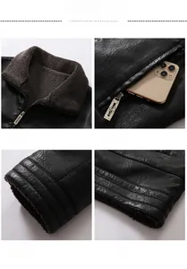 Detail view of black faux leather jacket with warm brown faux fur lining and metal zipper