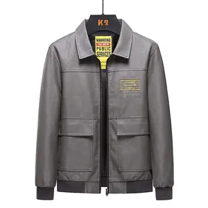 Dark grey faux leather motorcycle jacket with warm fleece lining and embroidered patches