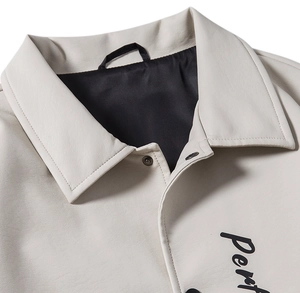 Men's off-shoulder cream faux leather jacket with turn-down collar and snap buttons