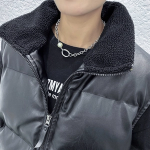 Men's silver chain necklace with light blue pearl and ring clasp on a model
