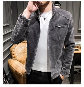Detail of men's vintage washed grey zip-up jacket with heavy canvas texture and metal zippers