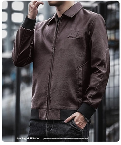 Close-up of brown PU leather jacket with AL embossed logo and ribbed cuffs