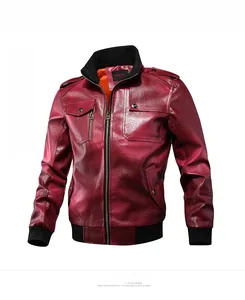 Detail view of burgundy faux leather motorcycle jacket with orange lining and rib-knit cuffs