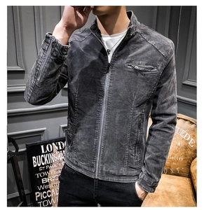 Detail view of dark grey retro men's jacket with textured fabric and metal zip pockets
