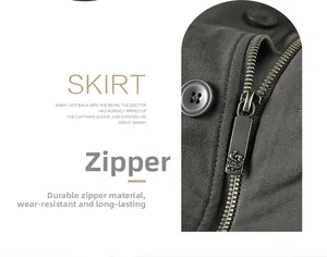 Close-up of a durable utility skirt featuring a vintage metal zipper and resin button