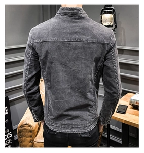 Back view of a charcoal gray denim jacket with vintage wash texture and zipper cuffs