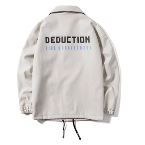 Detail of light beige jacket back featuring bold black DEDUCTION art font and tide warning text