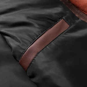 Men's slim fit PU leather jacket featuring black inner lining and brown leather pocket trim