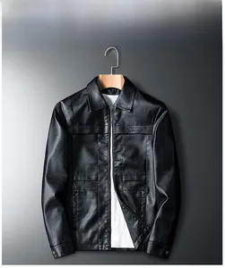 Detailed close-up of a black men's PU leather biker jacket with fine chest embroidery
